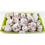 A quantity of miniature porcelain tea wares including Royal Adderley and Crown Staffordshire