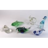 A collection of six glass animal paperweights: duck, elephant, bird, dolphin, whale and fish