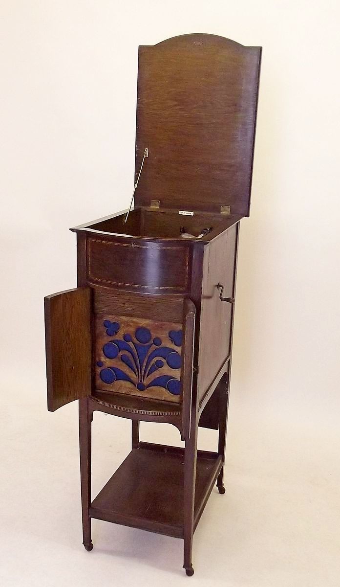 An HMV gramophone in floor standing oak case with inlay, and Exhibition style speakers