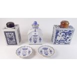 Three Chinese blue and white tea caddies and two matching pin dishes