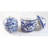 Two blue and white jars and covers 13cm tall