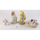 A Royal Doulton Winnie the Pooh, Dusty and Baby and a dalmation puppy, plus a miniature jug