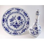 A large Portuguese blue and white plate 'Vista Alegre, 33cm diameter, and a similar vase