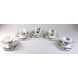 A Crown Staffordshire floral tea service comprising six cups and saucers and six tea plates
