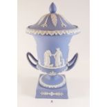A Wedgwood Jasperware two handled urn and cover decorated classical scenes - 30cm