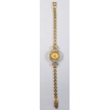 An 18 carat gold Chopard ladies 'Happy Diamonds' wrist watch and strap