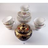 A 1950's vintage floral and gilt tea service comprising six cups and saucers and six tea plates plus