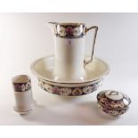 An Edwardian Falcon Ware jug and bowl toiletry set with soap dish and toothbrush mug