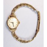 A 9 carat gold Excalibur ladies wrist watch and strap (overall weight 14.2g)