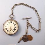 A silver pocket watch with seconds dial 'Improved Patent' with key and silver fob chain, the chain