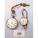 A silver fob watch and a silver ladies wrist watch