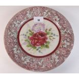 A German porcelain plate painted roses