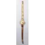 An Omega 9 carat gold ladies wrist watch and strap