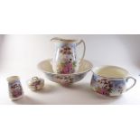 A toiletry set comprising jug and bowl, chamber pot, soap dish and toothbrush mug - printed lady