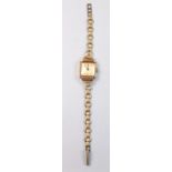 An 18k gold 1920's ladies wrist watch