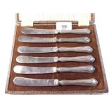 A cased set of six silver handled cake knives