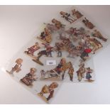 A collection of thirty four French decoupage musical themed cut-outs