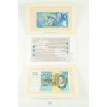 An Australian $10 presentation folder, two uncirculated 1993 notes, one the last paper note, the