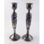 A pair of Persian cast silver candlesticks - 589g