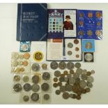 A quantity of pre-decimal coinage including brass threepences and sixpences through to halfcrowns, a