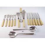 A fish cutlery set with silver collars, a pair of silver salad servers a/f, and a silver plated