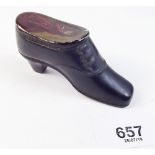 A treen shoe form snuff box with striker