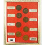 A glazed frame collection of Eire pennies - dates including: 1928 x 5, 1933, 1948 and 1963 -