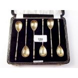 A set of continental silver and silver gilt coffee spoons boxed