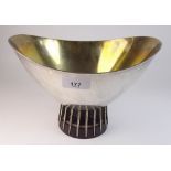 A modern design silver gilt elliptical form bowl on rosewood base, Birmingham 1970, 24 cm wide,