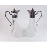 Two silver plated and glass claret jugs
