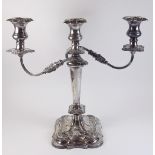 A large silver three branch candelabra with foliage decoration by Viners Ltd (Emile) Sheffield 1964