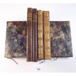 A small group of leather bound literary books