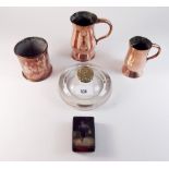 A Victorian glass inkwell with embossed brass lid three copper items and a lacquer vesta holder