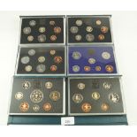 Six Royal Mint issue UK Proof Coin Collections for years: 1982, 1983, 1984 x 2, 1988 and 1993.