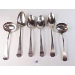 Two pairs of silver serving spoons, 229g and a pair of silver sauce ladles - London 1823, 326g