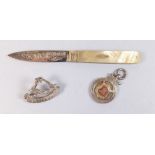 A silver and mother of pearl folding fruit knife with engraved decoration - Birmingham 1850, a