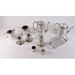 A silver plated toast rack and various other silver plated items including teaset and cake basket