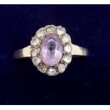 A 9 carat gold amethyst and white stone cluster ring - size P