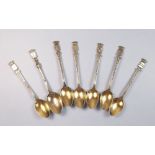 Seven continental teaspoons with gilt bowls and engraved the names of Belgium towns