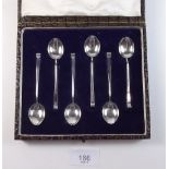 A set of six silver Art Deco coffee spoons - Birmingham 1828, by Hukin and Heath - boxed