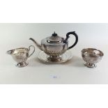 A silver plated fluted three piece tea service