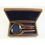 A wood cased nautical themed magnifiying glass