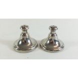 A pair of early 20th century silver plated squat hat pin holders