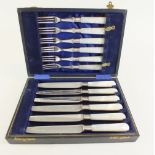 A silver plated and mother of pearl fruit cutlery set - boxed