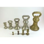 A 19th century matched set of graduated brass bell weights