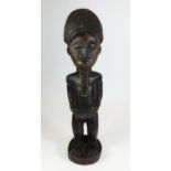 An African Boaule carved wood figurine - 29cm tall
