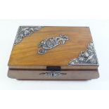 A wooden jewellery box with embossed white metal decoration - 18cm wide