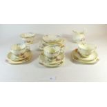 A New Chelsea 'Terrace' part tea service comprising three cups, six saucers, six tea plates, milk,