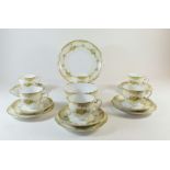 A Noritake floral printed tea service comprising six cups and saucers, six tea plates, jug, sugar,