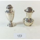 A Victorian silver pepperette together with a later silver salt